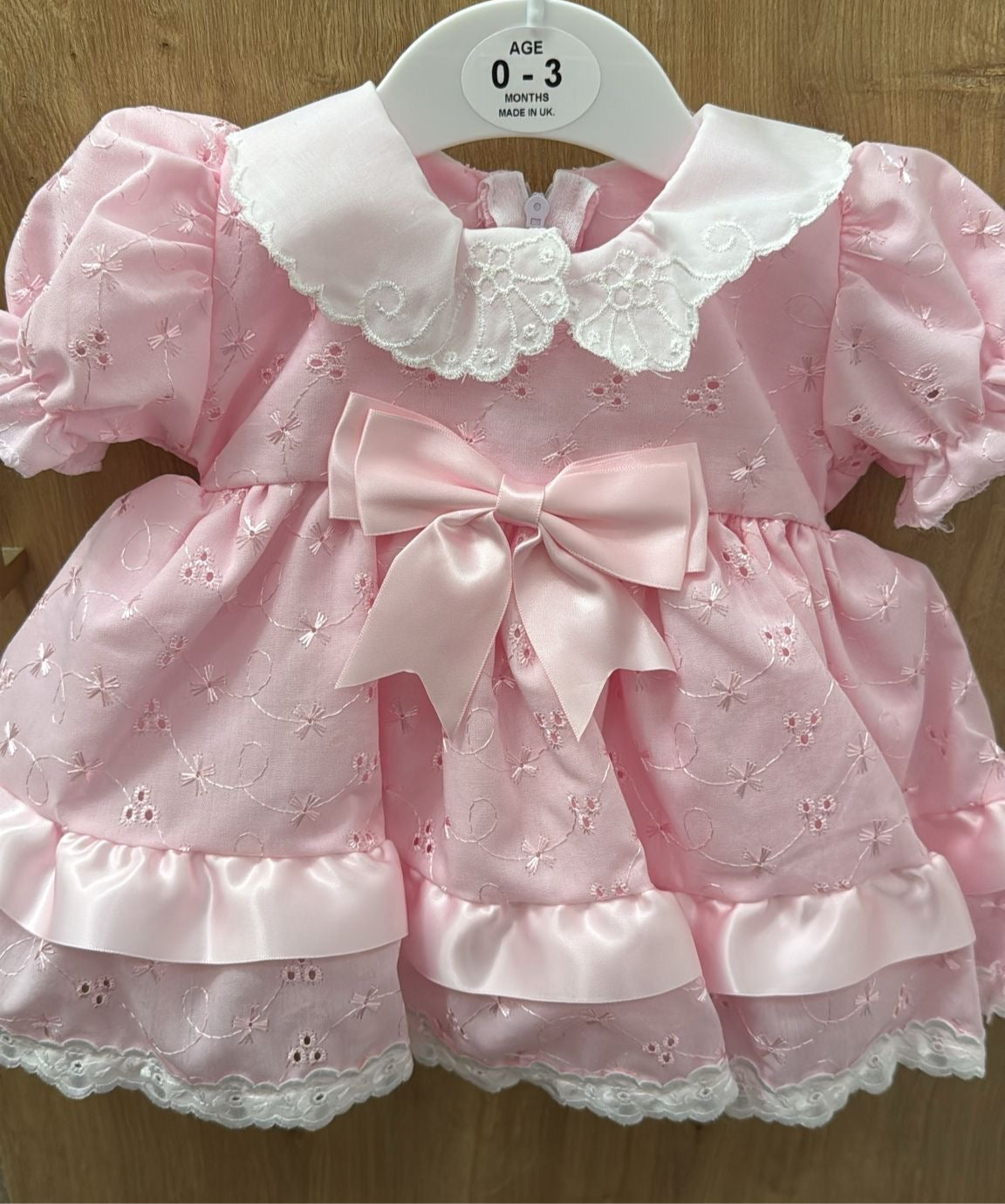 Pink frilly bow dress