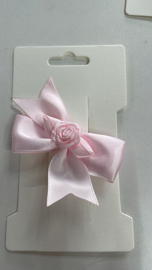 Pink rosebud bow clip