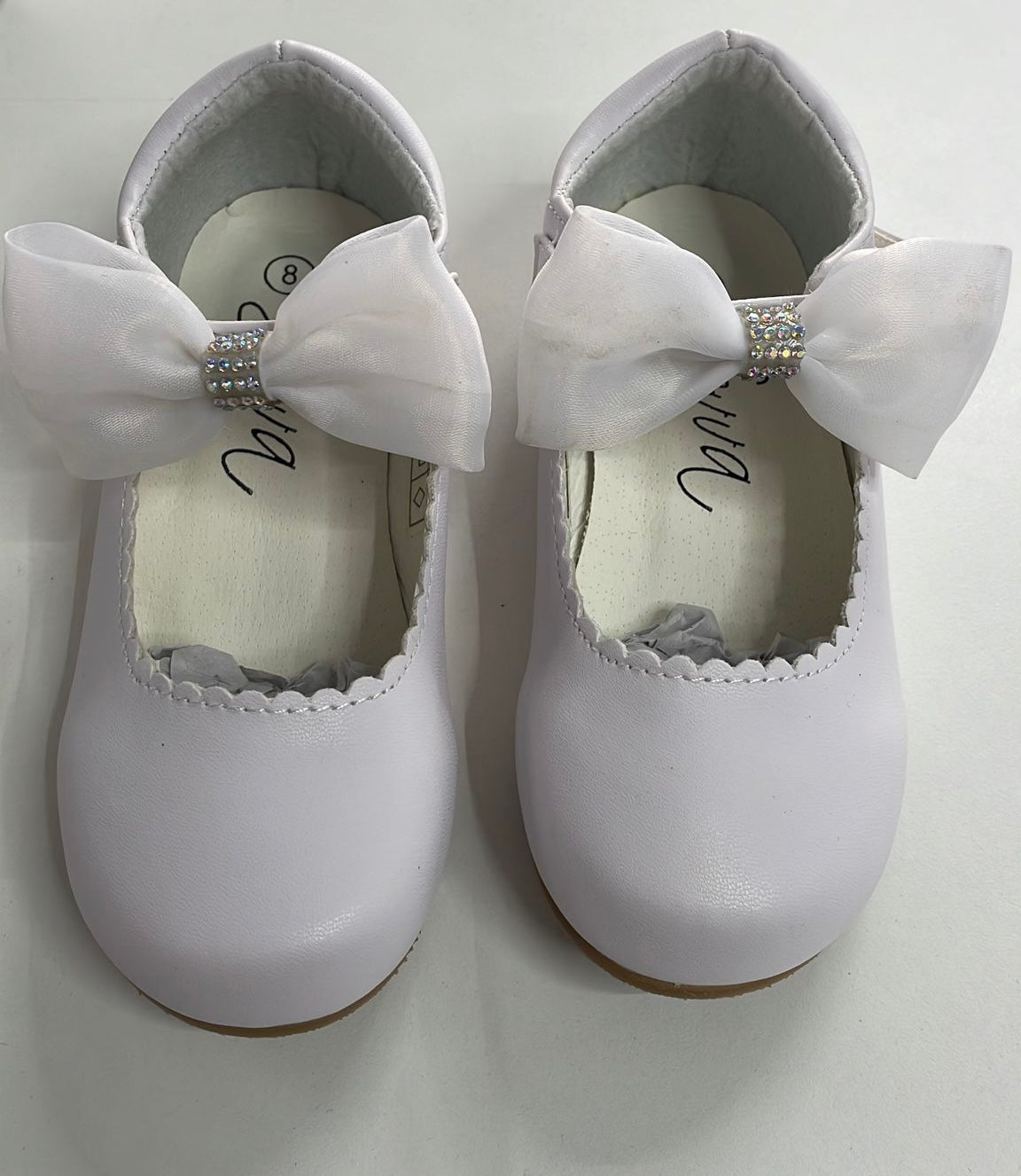 Sevva White bow shoes